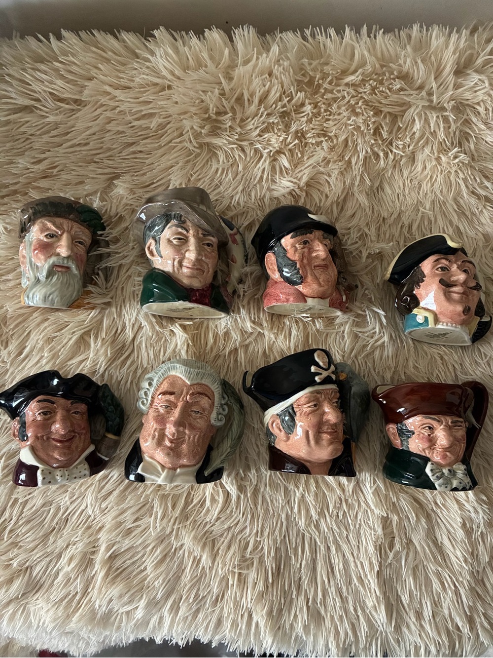 ROYAL DOULTON minature mugs. Set of 8.